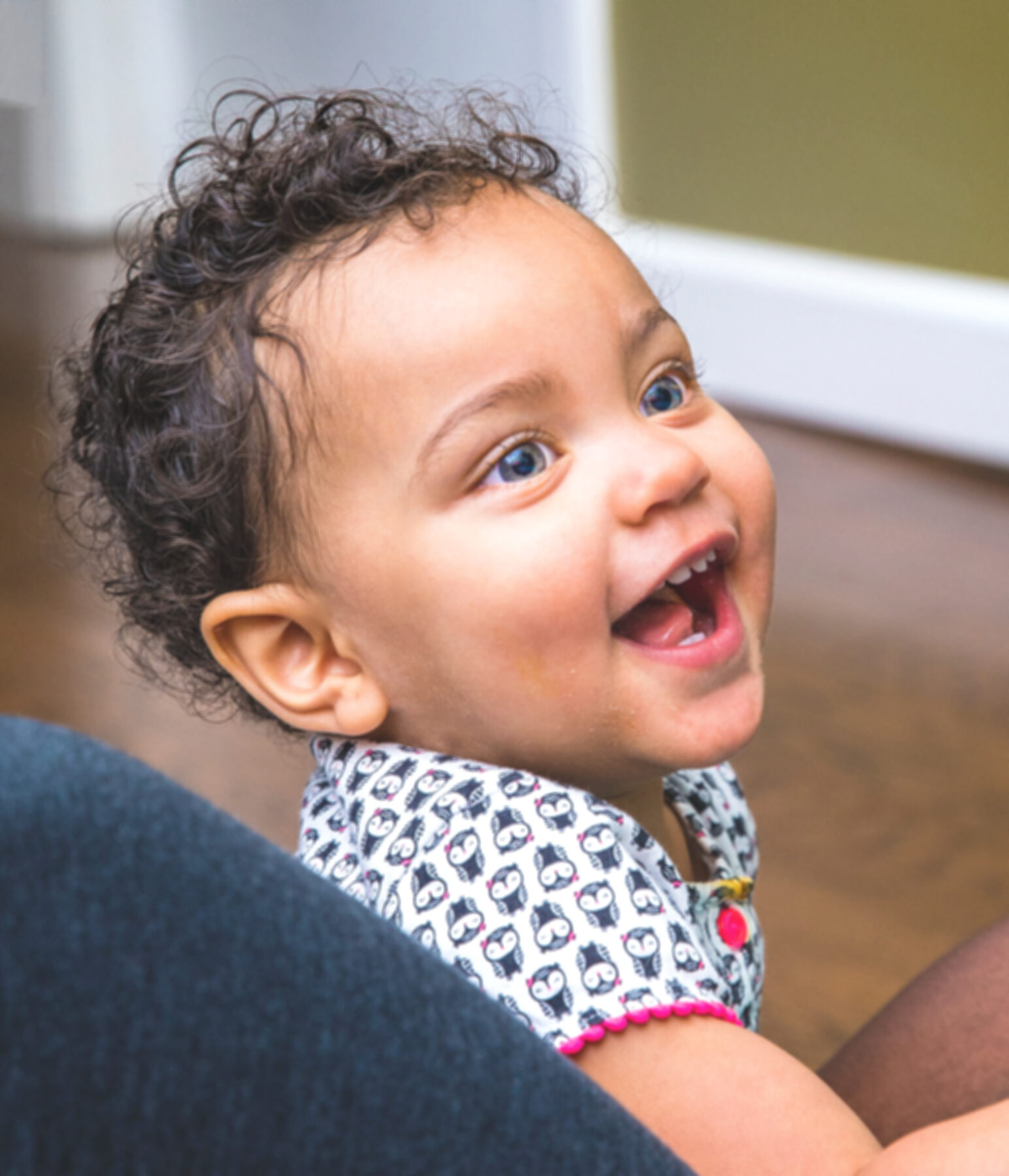 A smiling baby at our pediatric eye care office in Holland, Michigan